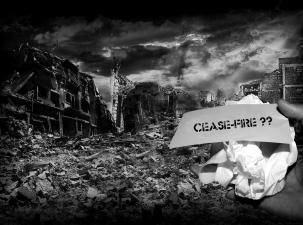 Black and white destroyed buildings with piles of rubble on the floor - hand holding a note which says 'ceasefire??'