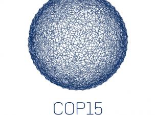Blue COP15 logo with Copenhagen UN Climate Change Conference 2009 written underneath in blue - Messy blue circle above