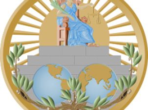 International Court of Justice Seal - A figure in a blue tunic sits on a grand chair holding a balance. Below is two images of different sides of the Earth. It is suurrounded by a golden circle and many green leaves