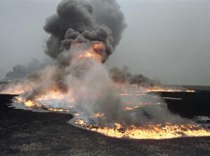Oil fields set ablaze by Iraqi occupation forces in Al-Maqwa.