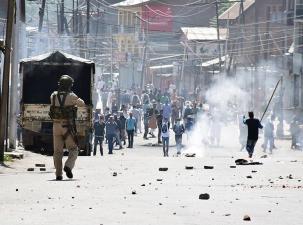 Police in Kashmir confronting violent protesters December 2018