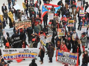 500 demonstrators rallied outside the Trump Building on Manhattan's Wall Street to protest the United States' sanctions, diplomatic maneuvers and military threats against Venezuela. 