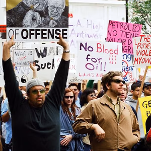 March Against Iraq War in Los Angeles, many people holder anti-war posters 