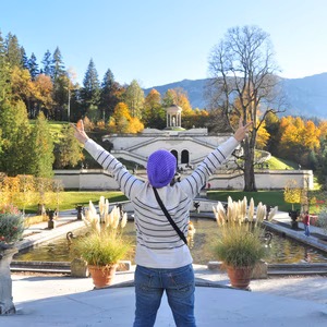 A Happy girl during her vacation time in Germany at the beautiful castle garden
