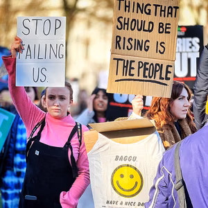Two women protest in London about the cost of living crisis