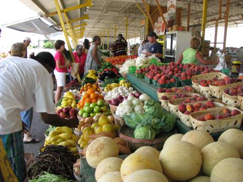 Fruit and vegetables are displayed on tables at a farmers market in Mississippi