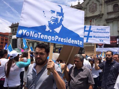 Guatemalan protesters are holding banners that say 'I don't have a president' in the nationwide protests of 2017