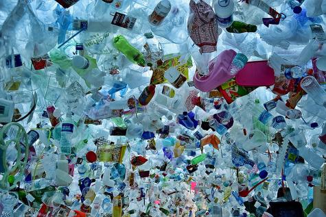 Art installation of wasted materials by Tan Zi Xi (Singapore) Thousands of disguarded plastic products hang to symbolise the problem with plastic waste