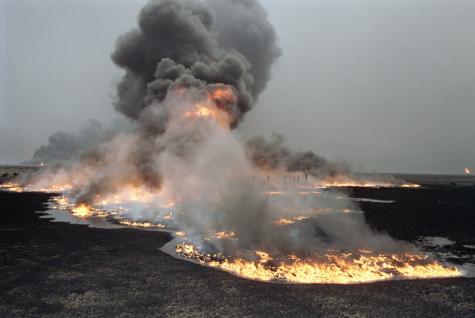 Oil fields set ablaze by Iraqi occupation forces in Al-Maqwa.
