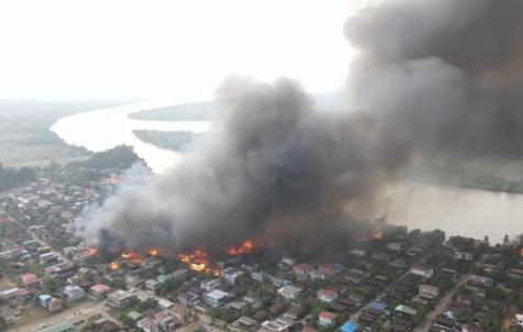 Mon State Kyomaro Township where many houses have been set on fire due to the SAC's air attack on Dhammatha village as well as heavy weaponry. This is an image from above of the destruction and the huge cloud of smoke.