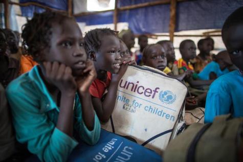 School children sit at their desks in a refugee camp in Ethiopia.
