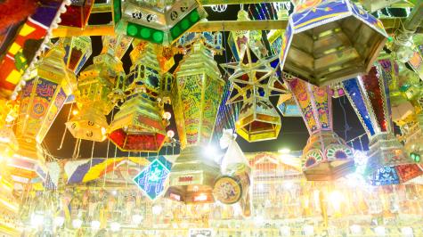 Sayida Zeinab square in Islamic Cairo. Traditional coloured glassed Egyptian lanterns hang at the market.