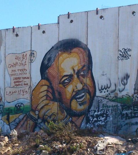 Mural of Palestinian rights activist and political figure Marwan Barghouti. It is painted on the Israeli separation wall in Kalandia, the crossing point between Jerusalem and Ramallah.