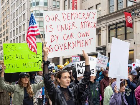 People marching in the rain for the No Kings protest in Manhattan, New York.