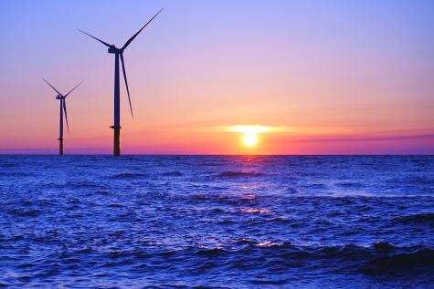 Offshore wind farm photographed at the Port of Noshiro, at sunset