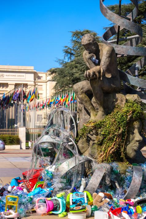 Art installation in front of the Palais des Nations in Geneva, Switzerland symbolising the burden of plastic waste.