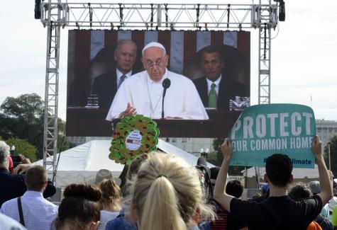 Around three thousand climate justice activists participated in a rally with speeches and musical performances with the support of Pope Francis who is on a large screen giving a speech.