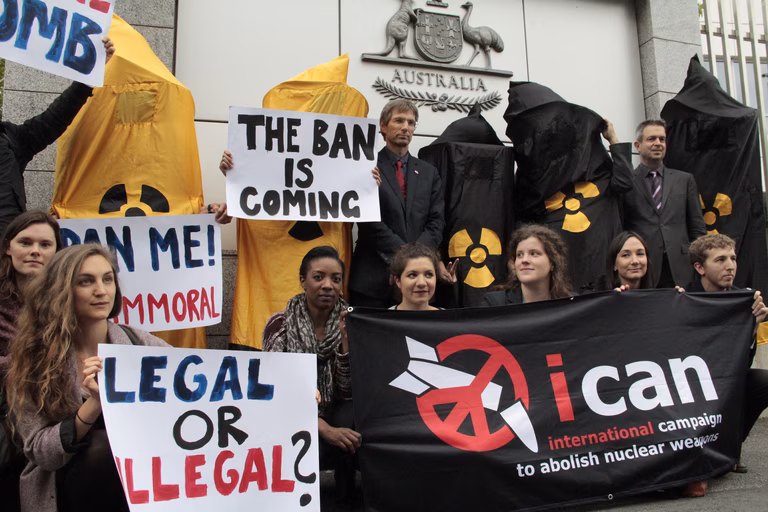ICAN campaigners protest outside Australia's permanent mission to the UN at Geneva, during the May session of the UN open-ended working group on nuclear disarmament
