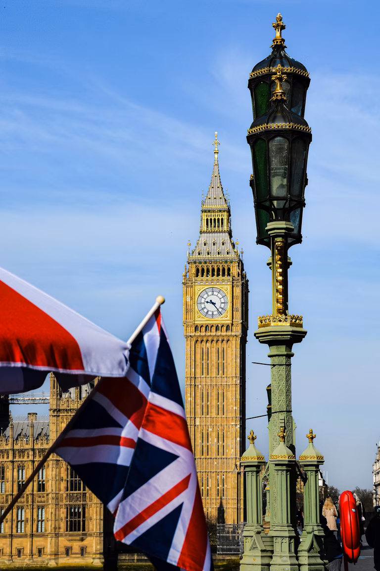 View of Flags and Big Ben in London, England, UK